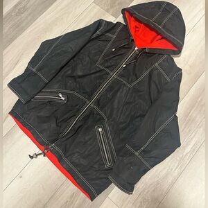 Vintage 80's Black Hooded Jacket with Red Lining
Size XL